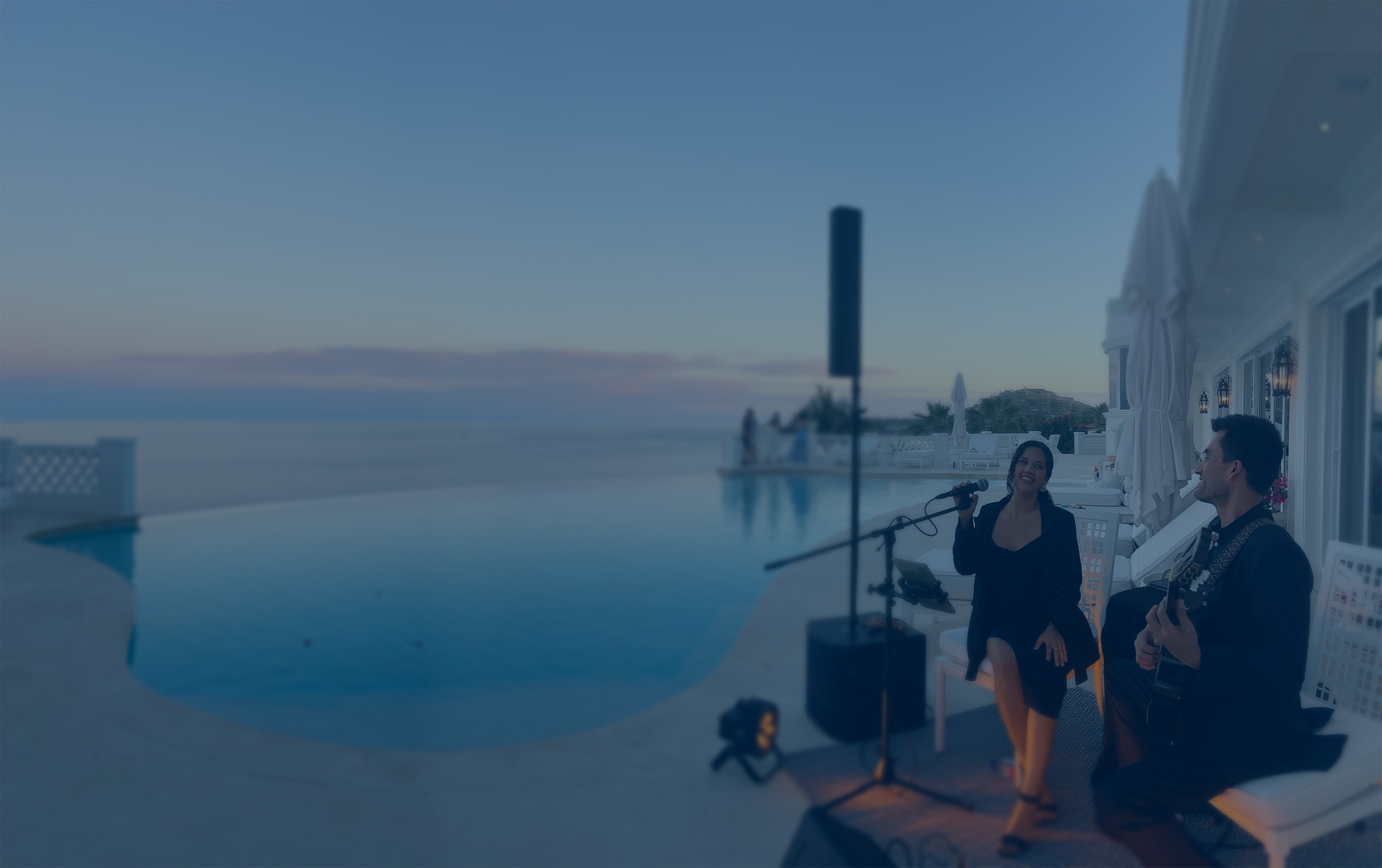 Mimosa Vibe performing poolside at sunset